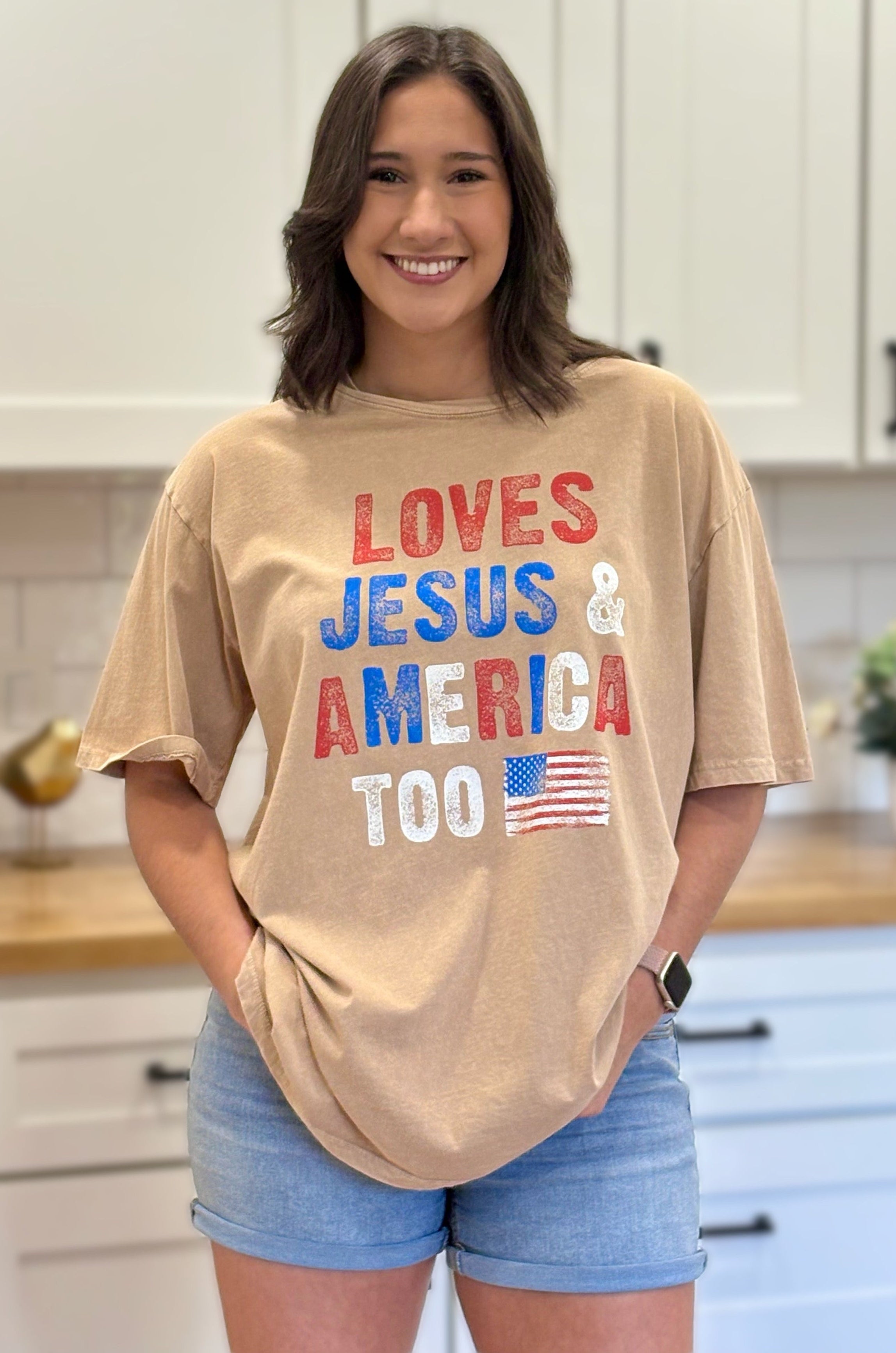 Women’s washed oversized graphic tee with vintage look and soft cotton fabric.