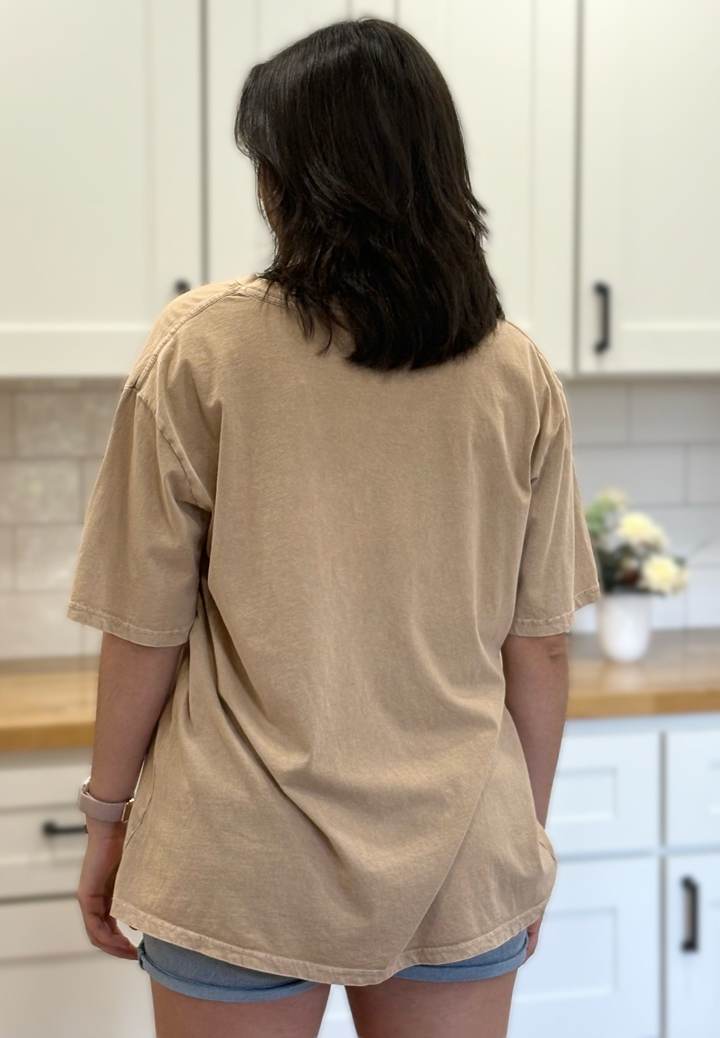 Women’s washed oversized graphic tee with vintage look and soft cotton fabric