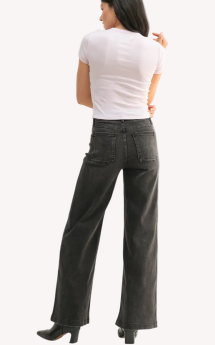 Washed black high-waisted wide-leg jeans — elevated modern denim from Justyna Grace Boutique.