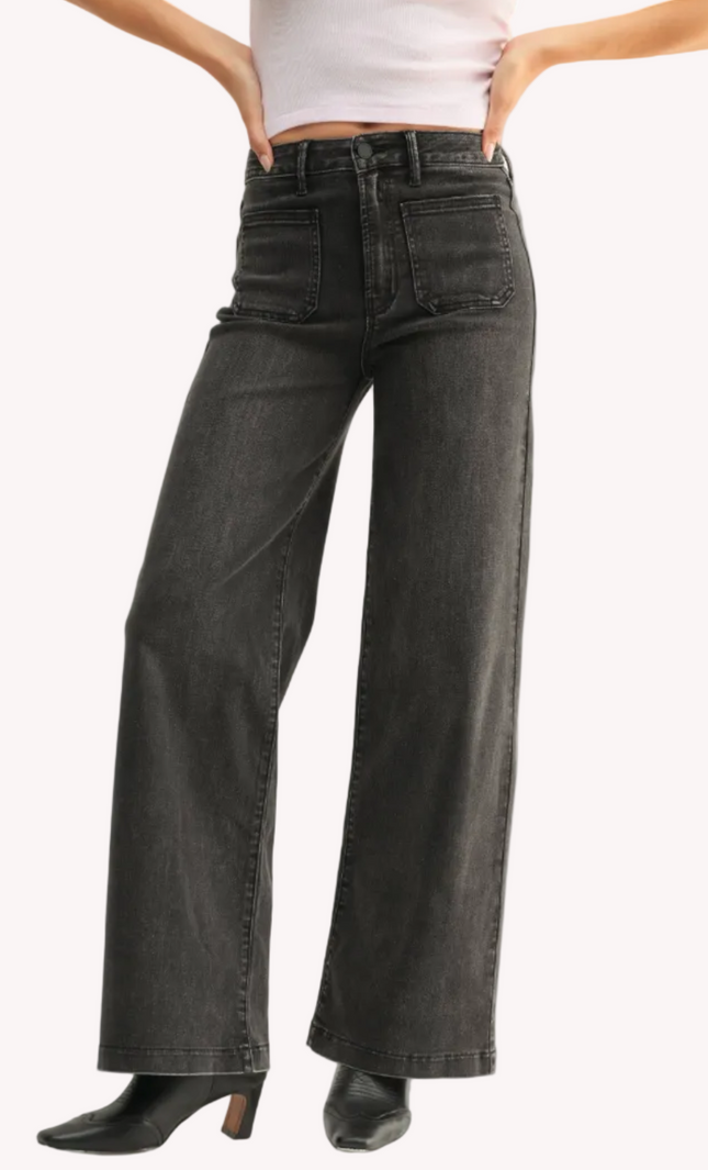 Vintage-inspired dark-wash denim overalls with adjustable straps — relaxed and timeless from Justyna Grace Boutique.