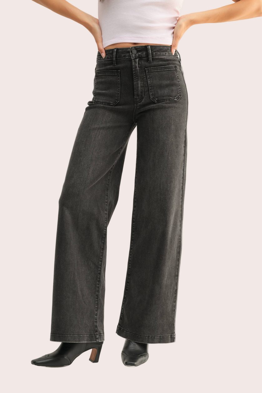 Vintage-inspired dark-wash denim overalls with adjustable straps — relaxed and timeless from Justyna Grace Boutique.