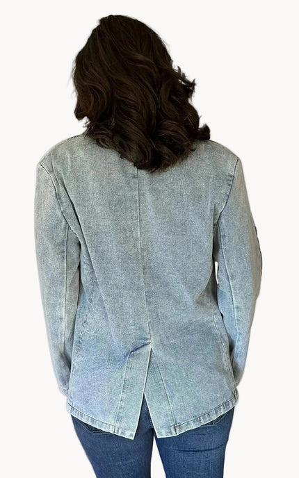 Oversized denim blazer with long sleeves and subtle shoulder pads