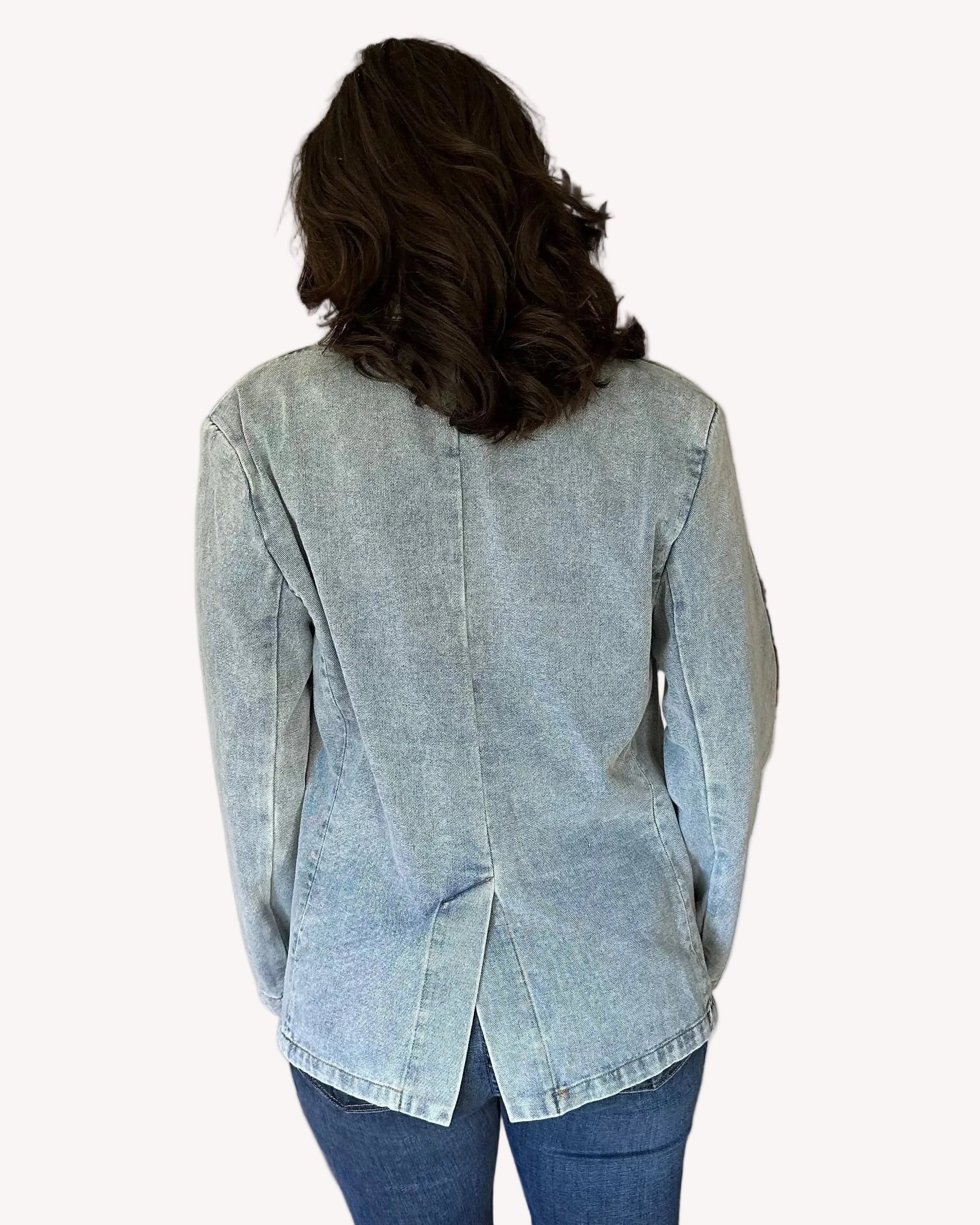 Oversized denim blazer with long sleeves and subtle shoulder pads