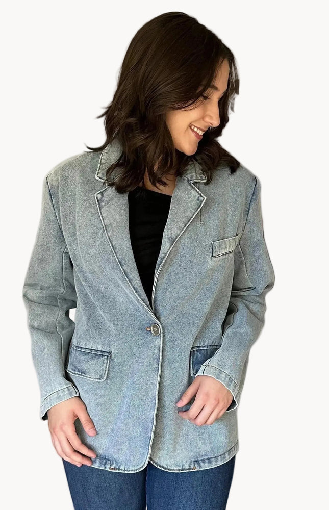 Oversized washed denim blazer with notch lapels and single-button closure
