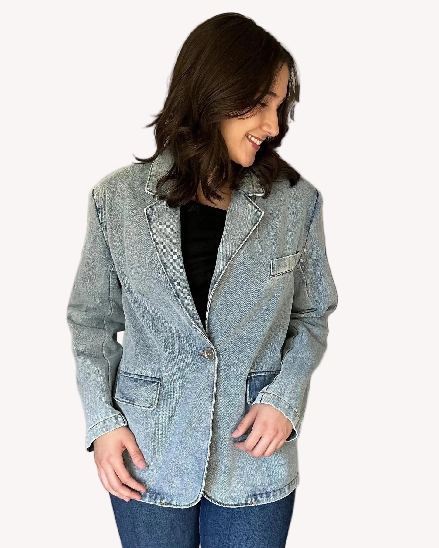 Oversized washed denim blazer with notch lapels and single-button closure