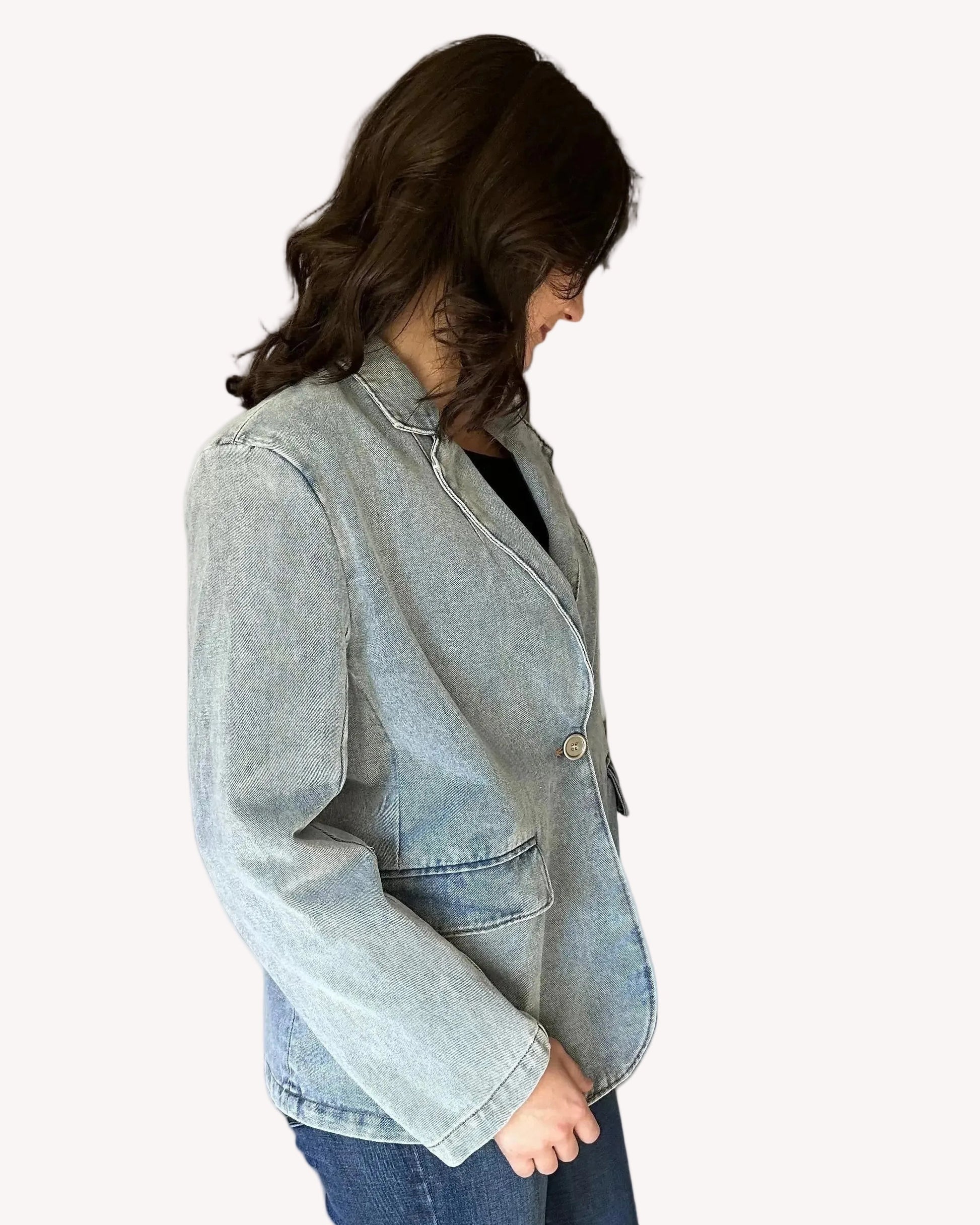 Relaxed fit denim blazer with structured tailoring and washed finish