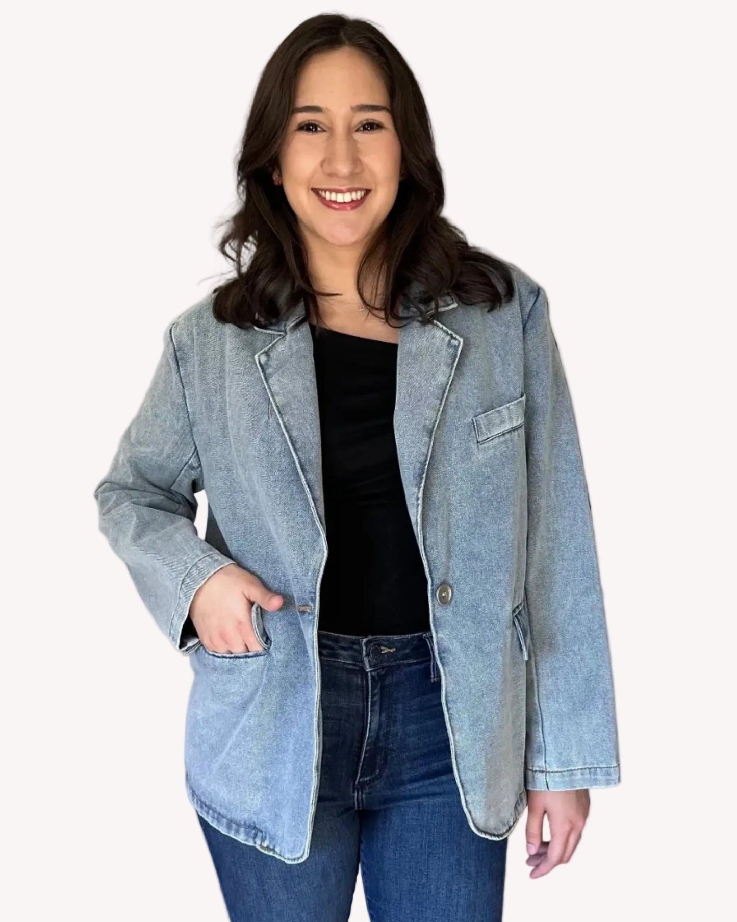 Oversized washed denim blazer with notch lapels and single-button closure