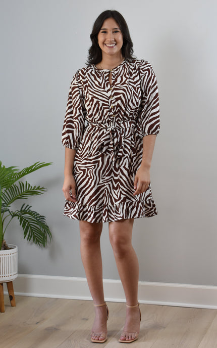 Wild Grace Zebra Tie Dress in ivory and brown print with round neckline and waist tie